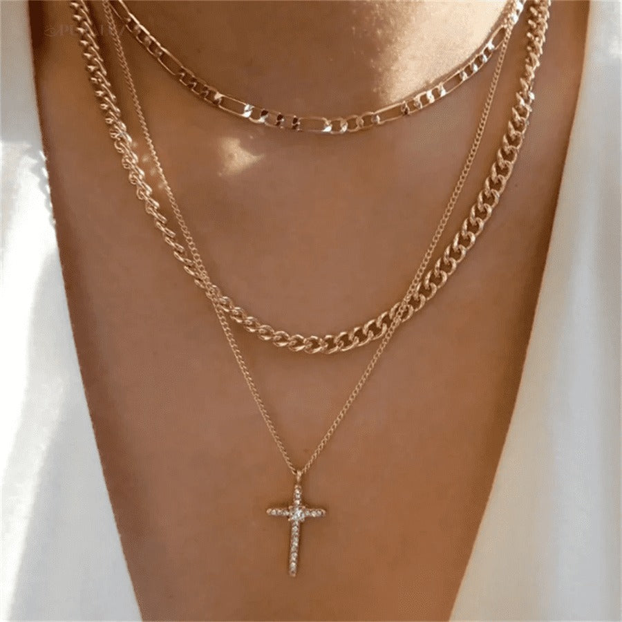 Divine necklace set; Pearl and crucifix jewelry; Elegant pearl necklaces; Stylish crucifix pendants; Handmade pearl jewelry; Christian faith necklaces; Unique pearl and crucifix design; Versatile necklace set; Fashionable religious jewelry; Statement pearl necklaces; Personalized crucifix necklaces; Luxurious pearl and gold jewelry; Spiritual symbolism necklaces; Layered pearl necklace set; Artisan-crafted crucifix jewelry; Gift for faith; Beautifully designed pearl necklaces; Modern crucifix jewelry;