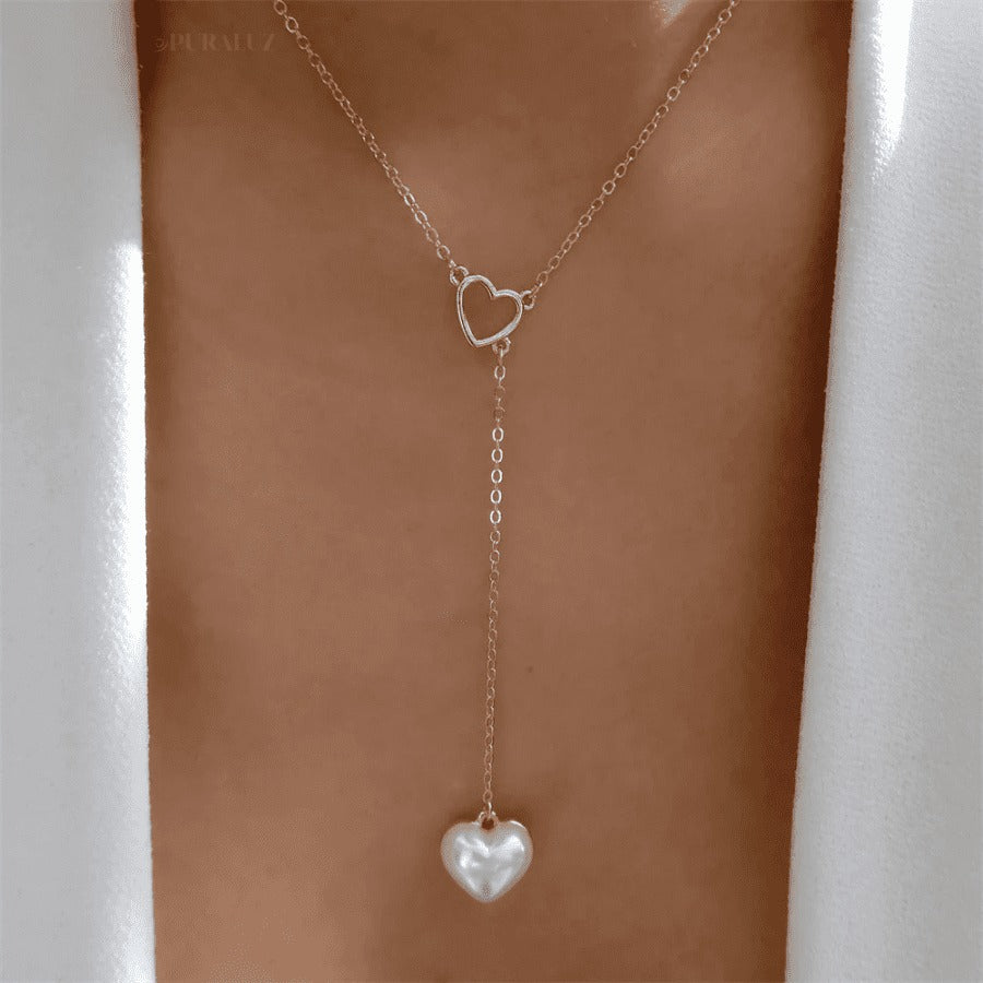 Divine necklace set; Pearl and crucifix jewelry; Elegant pearl necklaces; Stylish crucifix pendants; Handmade pearl jewelry; Christian faith necklaces; Unique pearl and crucifix design; Versatile necklace set; Fashionable religious jewelry; Statement pearl necklaces; Personalized crucifix necklaces; Luxurious pearl and gold jewelry; Spiritual symbolism necklaces; Layered pearl necklace set; Artisan-crafted crucifix jewelry; Gift for faith; Beautifully designed pearl necklaces; Modern crucifix jewelry;
