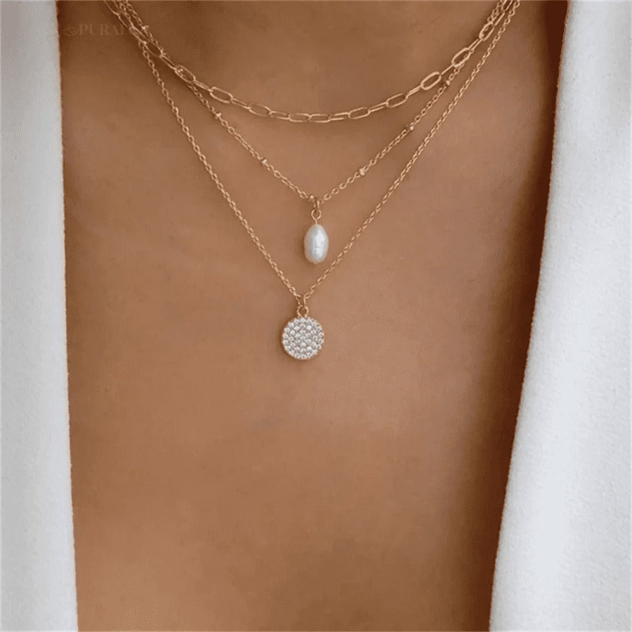 Divine necklace set; Pearl and crucifix jewelry; Elegant pearl necklaces; Stylish crucifix pendants; Handmade pearl jewelry; Christian faith necklaces; Unique pearl and crucifix design; Versatile necklace set; Fashionable religious jewelry; Statement pearl necklaces; Personalized crucifix necklaces; Luxurious pearl and gold jewelry; Spiritual symbolism necklaces; Layered pearl necklace set; Artisan-crafted crucifix jewelry; Gift for faith; Beautifully designed pearl necklaces; Modern crucifix jewelry;