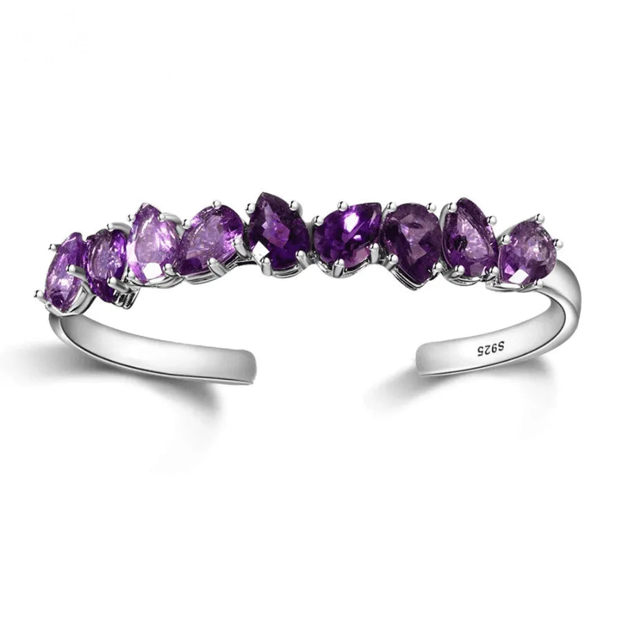 Sterling silver bracelet; Amethyst stone bracelet; Silver jewelry with amethyst; Elegant sterling silver bracelet; Handmade amethyst bracelet; Gemstone silver bracelet; Amethyst embedded bracelet; Unique sterling silver design; Stylish silver bracelet; Luxury amethyst jewelry; Birthstone bracelet; Healing stone bracelet; Adjustable silver bracelet; Fashionable amethyst piece;