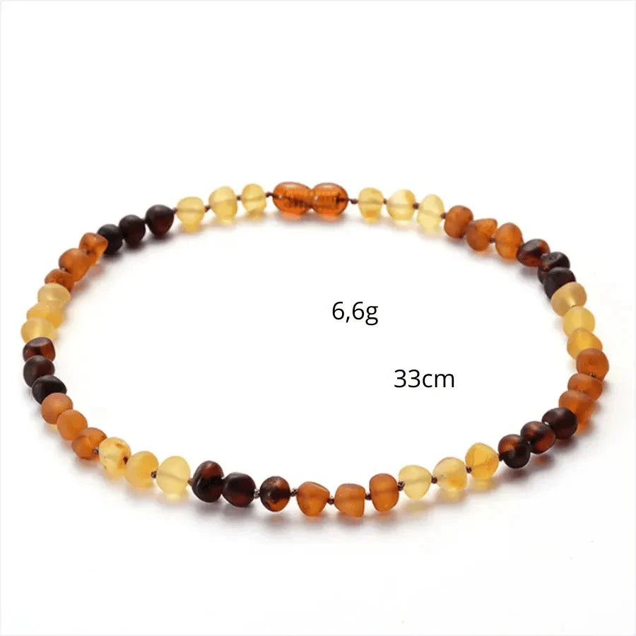 Natural Amber Necklace; Amber necklace for babies; Amber teething necklace; Amber necklace for adults; Soothing amber jewelry; Natural amber healing; Baltic amber necklace; Baby amber teething relief; Adult amber necklace; Amber stone benefits; Non-toxic amber necklace; Eco-friendly amber jewelry; Stylish amber accessory; Amber necklace for sensitive skin; Amber for wellness; Organic amber jewelry; Durable amber necklace;