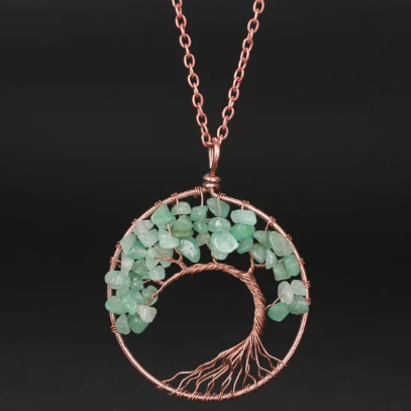 Tree of Life necklace; Natural crystals jewelry; Symbol of growth and strength; Handcrafted with care and precision; Beautifully designed for everyday wear; Promotes balance and harmony; Perfect for nature lovers; Enhances spiritual connection and healing; Ethically sourced natural stones; Lightweight and comfortable to wear; Unique and meaningful gift;