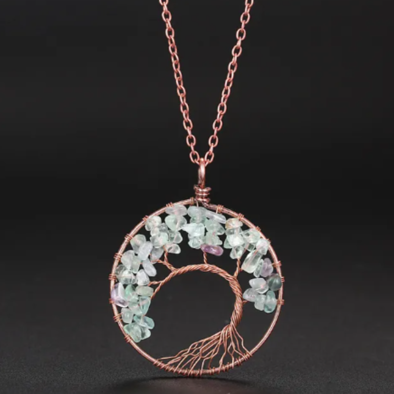 Tree of Life necklace; Natural crystals jewelry; Symbol of growth and strength; Handcrafted with care and precision; Beautifully designed for everyday wear; Promotes balance and harmony; Perfect for nature lovers; Enhances spiritual connection and healing; Ethically sourced natural stones; Lightweight and comfortable to wear; Unique and meaningful gift;