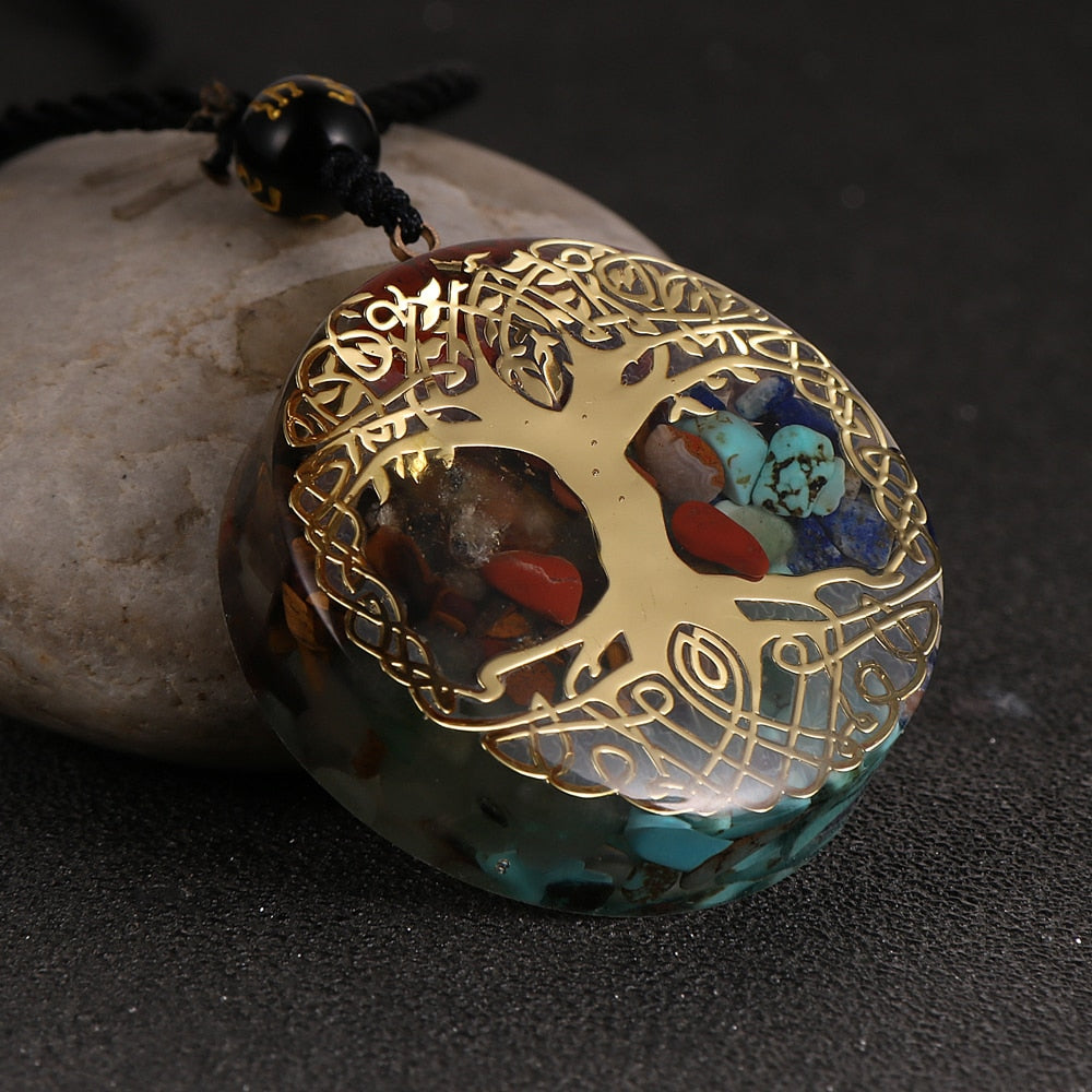 Tree of Life orgonite necklace; Handcrafted spiritual jewelry; Unique design symbolizing growth and connection; Artisan-crafted accessory; Ethically sourced materials; Gift for nature lovers and spiritual seekers; Stylish and meaningful for everyday wear; Durable and fashionable; Beautifully detailed Tree of Life symbol; Necklace for enhancing positive energy and protection; Natural elements for emotional healing and balance; Lightweight and comfortable;