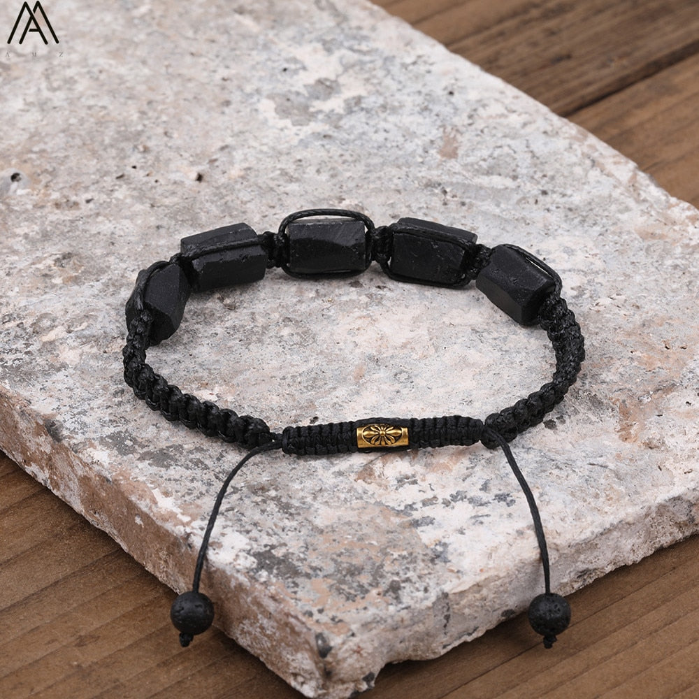 Tourmaline natural black bracelet; Handcrafted gemstone jewelry; Unique design for grounding and protection; Artisan-crafted accessory; Ethically sourced black tourmaline; Gift for wellness enthusiasts; Stylish and sleek for everyday wear; Durable and fashionable; Beautifully polished black tourmaline beads; Unique spiritual gift; Bracelet for emotional balance and stability; Natural stones for energy cleansing; Lightweight and comfortable; Ideal for meditation and healing practices;