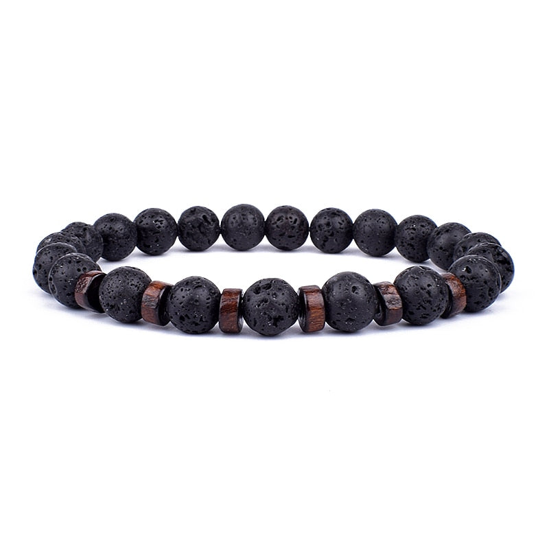Tibetan bracelet; Volcanic lava stone bracelet; Handcrafted spiritual jewelry; Unique design for grounding and strength; Artisan-crafted accessory; Ethically sourced volcanic lava; Gift for those seeking stability; Stylish and rugged for everyday wear; Durable and fashionable; Beautifully textured lava beads; Unique spiritual gift; Bracelet for protection and emotional balance; Natural stones for personal empowerment; Lightweight and comfortable; Ideal for meditation practices;