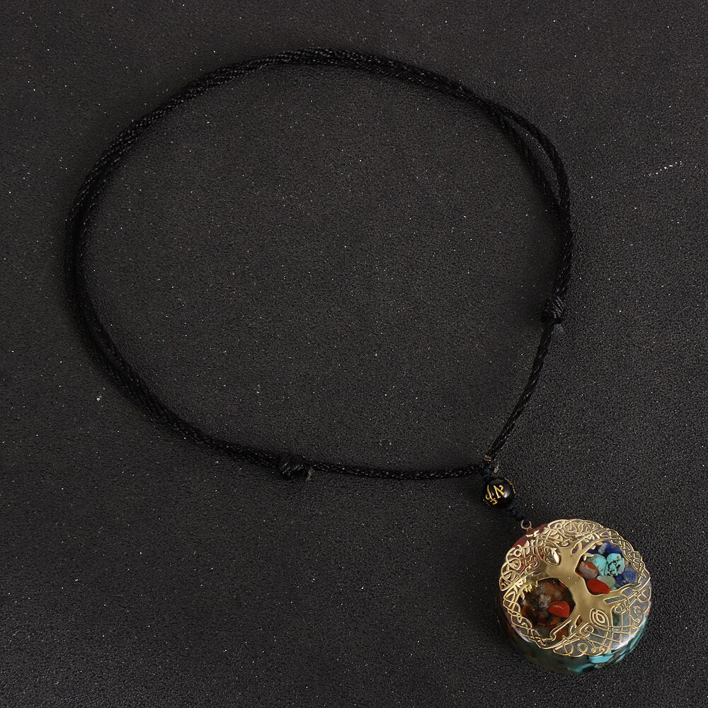 Tree of Life orgonite necklace; Handcrafted spiritual jewelry; Unique design symbolizing growth and connection; Artisan-crafted accessory; Ethically sourced materials; Gift for nature lovers and spiritual seekers; Stylish and meaningful for everyday wear; Durable and fashionable; Beautifully detailed Tree of Life symbol; Necklace for enhancing positive energy and protection; Natural elements for emotional healing and balance; Lightweight and comfortable;