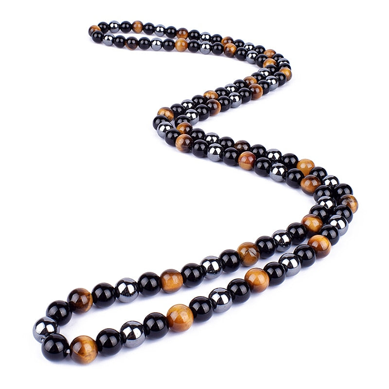 Triple protection necklace; Symbol of protection, power, and balance; Handcrafted artisan jewelry; Unique design for spiritual strength; Ethically sourced materials for conscious living; Perfect gift for those seeking inner strength; Enhances personal energy and resilience; Durable and stylish for everyday wear; Lightweight and comfortable for all-day use; Ideal for layering with other necklaces; Represents harmony and well-being; Thoughtful gift for special occasions;