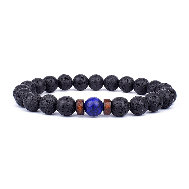 Tibetan bracelet; Volcanic lava stone bracelet; Handcrafted spiritual jewelry; Unique design for grounding and strength; Artisan-crafted accessory; Ethically sourced volcanic lava; Gift for those seeking stability; Stylish and rugged for everyday wear; Durable and fashionable; Beautifully textured lava beads; Unique spiritual gift; Bracelet for protection and emotional balance; Natural stones for personal empowerment; Lightweight and comfortable; Ideal for meditation practices;