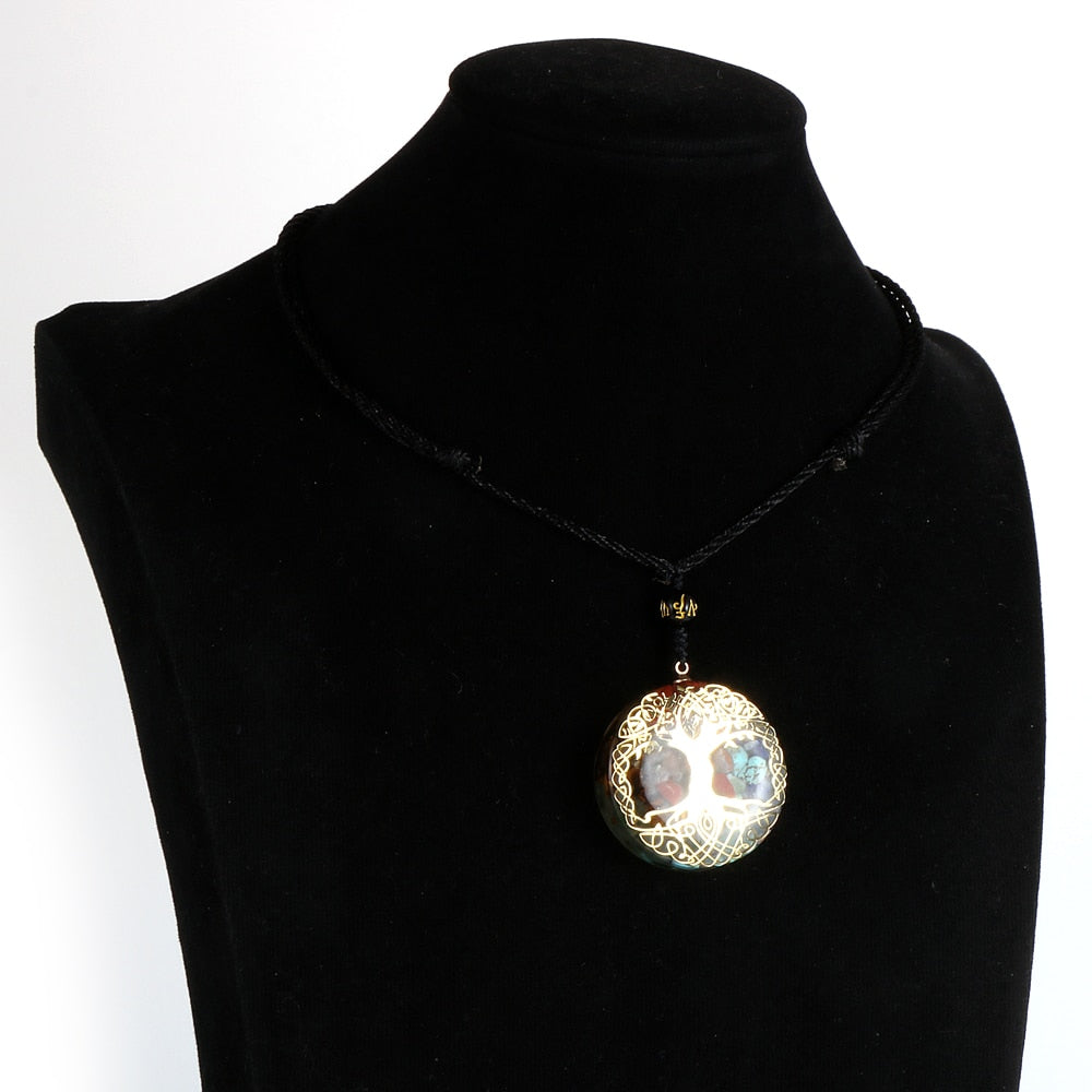 Tree of Life orgonite necklace; Handcrafted spiritual jewelry; Unique design symbolizing growth and connection; Artisan-crafted accessory; Ethically sourced materials; Gift for nature lovers and spiritual seekers; Stylish and meaningful for everyday wear; Durable and fashionable; Beautifully detailed Tree of Life symbol; Necklace for enhancing positive energy and protection; Natural elements for emotional healing and balance; Lightweight and comfortable;