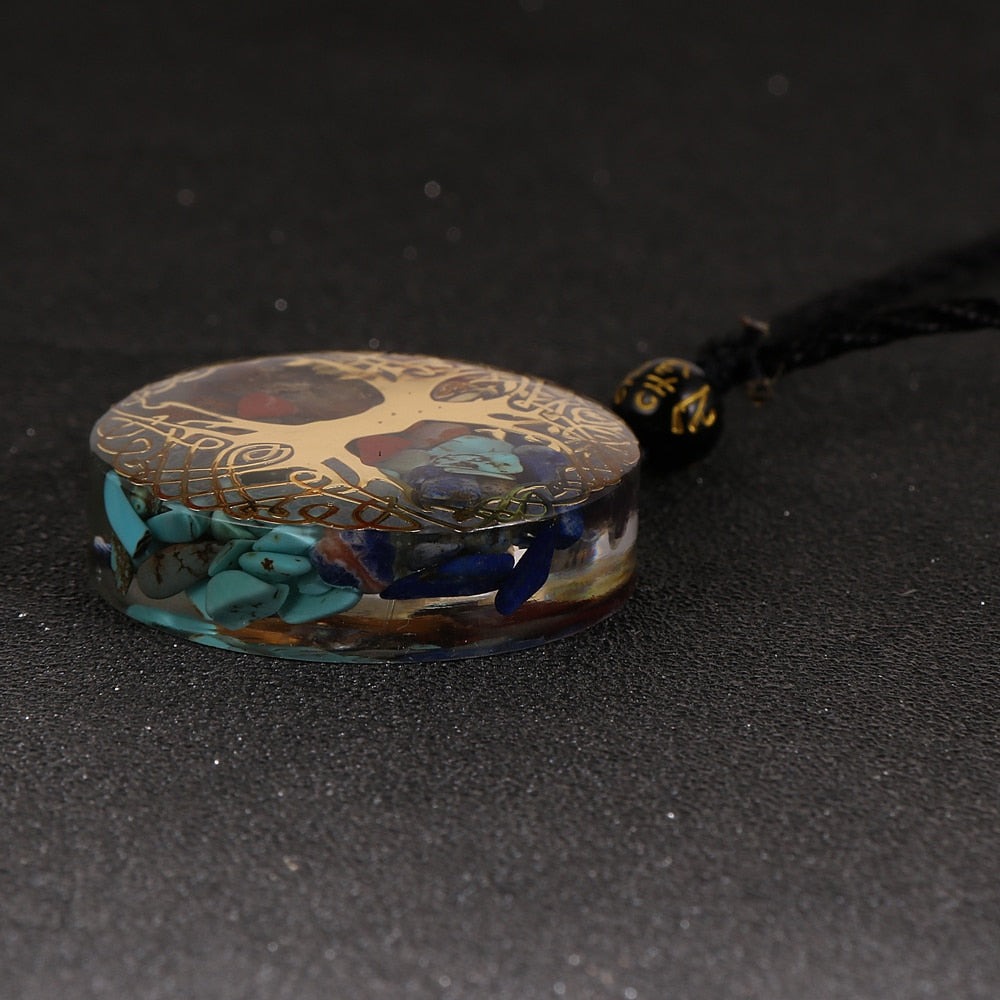 Tree of Life orgonite necklace; Handcrafted spiritual jewelry; Unique design symbolizing growth and connection; Artisan-crafted accessory; Ethically sourced materials; Gift for nature lovers and spiritual seekers; Stylish and meaningful for everyday wear; Durable and fashionable; Beautifully detailed Tree of Life symbol; Necklace for enhancing positive energy and protection; Natural elements for emotional healing and balance; Lightweight and comfortable;