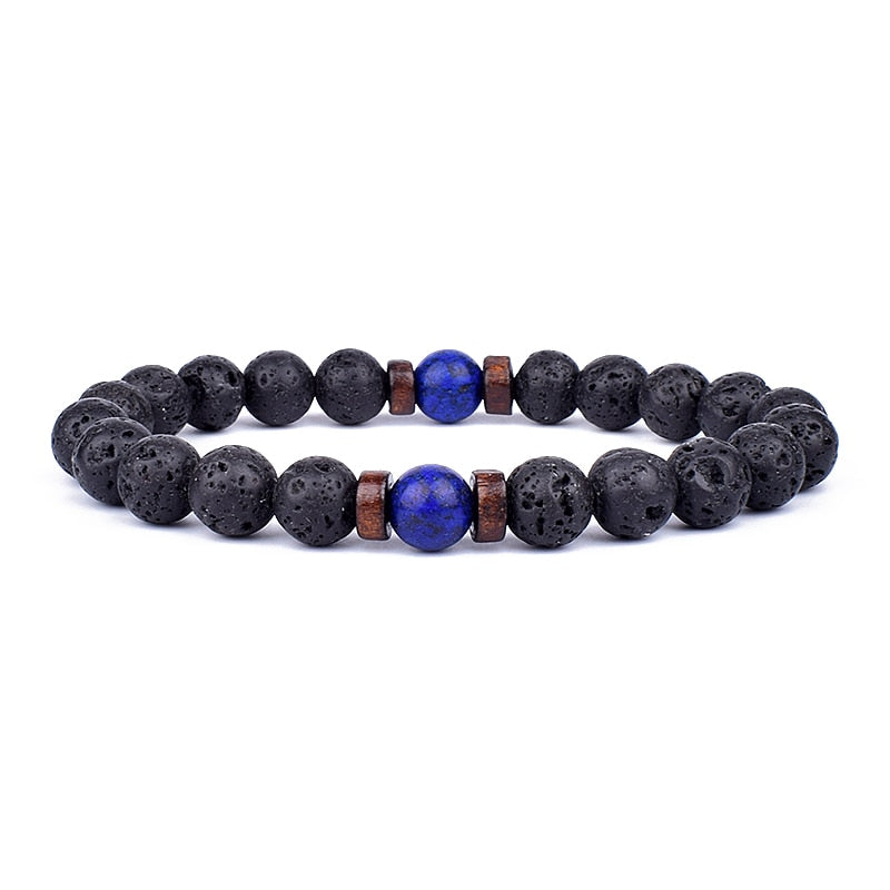 Tibetan bracelet; Volcanic lava stone bracelet; Handcrafted spiritual jewelry; Unique design for grounding and strength; Artisan-crafted accessory; Ethically sourced volcanic lava; Gift for those seeking stability; Stylish and rugged for everyday wear; Durable and fashionable; Beautifully textured lava beads; Unique spiritual gift; Bracelet for protection and emotional balance; Natural stones for personal empowerment; Lightweight and comfortable; Ideal for meditation practices;