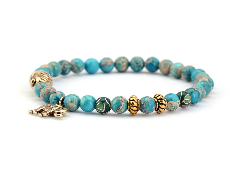 Buddhist bracelet; Natural stones bracelet; Handcrafted spiritual jewelry; Unique meditation accessory; Artisan-crafted bracelet; Ethically sourced natural stones; Bracelet for mindfulness; Gift for meditation practitioners; Healing energy bracelet; Calming meditation accessory; Bracelet for intention setting; Beautiful beaded bracelet; Unique spiritual gift; Bracelet for balance and harmony; Natural stones for grounding; Stylish and meaningful jewelry;