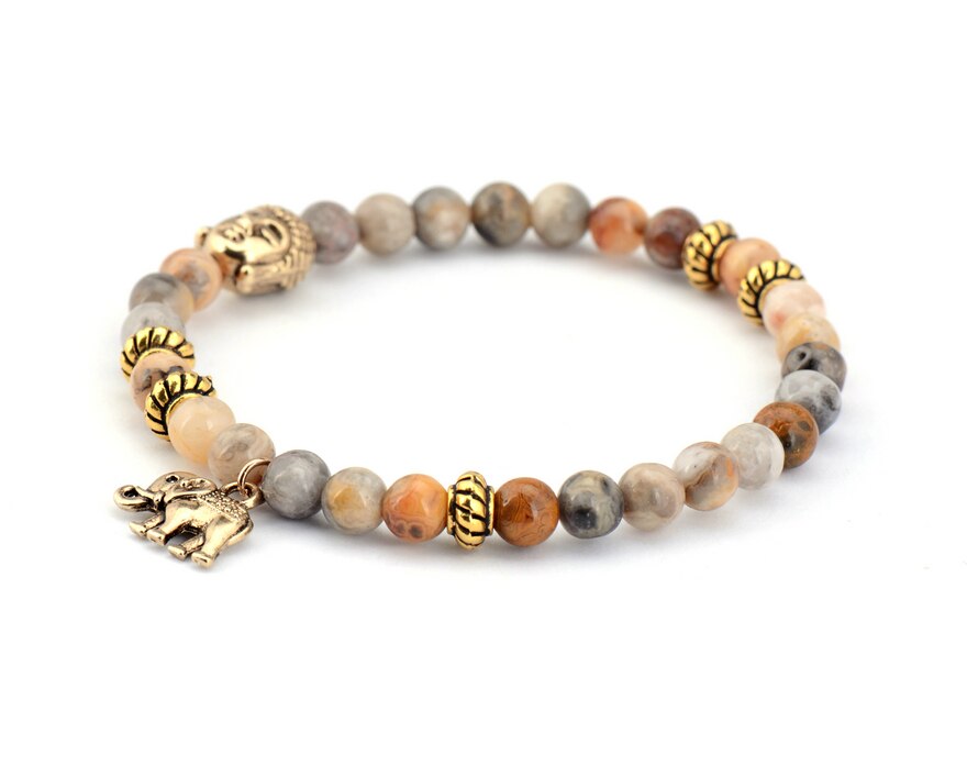 Buddhist bracelet; Natural stones bracelet; Handcrafted spiritual jewelry; Unique meditation accessory; Artisan-crafted bracelet; Ethically sourced natural stones; Bracelet for mindfulness; Gift for meditation practitioners; Healing energy bracelet; Calming meditation accessory; Bracelet for intention setting; Beautiful beaded bracelet; Unique spiritual gift; Bracelet for balance and harmony; Natural stones for grounding; Stylish and meaningful jewelry;