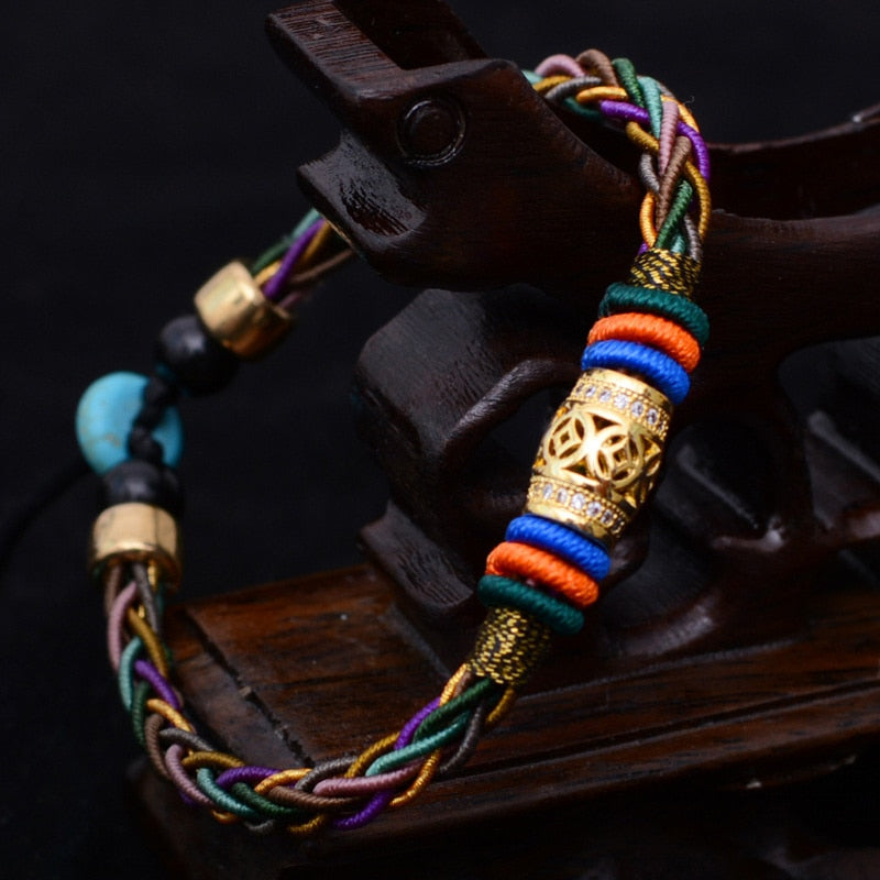 Tibetan 8-strand bracelet; Luck, health, and prosperity bracelet; Handcrafted Tibetan jewelry; Unique design for attracting good fortune; Artisan-crafted accessory; Ethically sourced materials; Gift for those seeking well-being and abundance; Stylish and meaningful for everyday wear; Durable and fashionable; Beautifully braided 8-strand design; Unique spiritual gift; Bracelet for enhancing vitality and balance; Natural elements for emotional and physical health; Lightweight and comfortable;