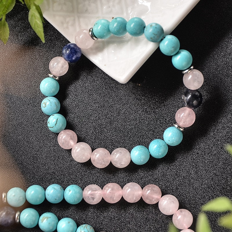 Spiritual Ascension japamala; Handcrafted prayer beads; Rose Quartz for love and healing; Sodalite for intuition and harmony; Turquoise for protection and communication; Unique meditation necklace; Artisan-crafted japamala; Natural gemstone beads; Japamala for mindfulness; Gift for meditation enthusiasts; Ethically sourced materials; Japamala for mantra repetition; Beautiful beaded necklace; Unique spiritual gift; Calming meditation accessory; Japamala for intention setting;
