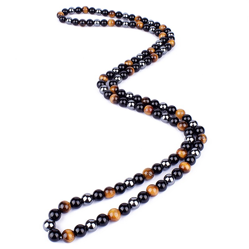 Triple protection necklace; Symbol of protection, power, and balance; Handcrafted artisan jewelry; Unique design for spiritual strength; Ethically sourced materials for conscious living; Perfect gift for those seeking inner strength; Enhances personal energy and resilience; Durable and stylish for everyday wear; Lightweight and comfortable for all-day use; Ideal for layering with other necklaces; Represents harmony and well-being; Thoughtful gift for special occasions;