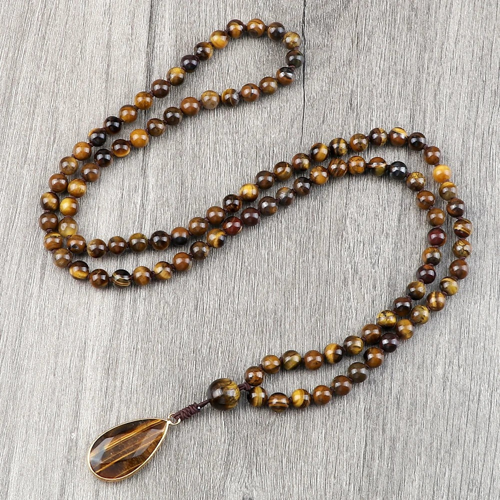 108 bead japamala; Tiger's Eye medal necklace; Handcrafted prayer beads; Spiritual jewelry; Artisan-crafted japamala; Natural Tiger's Eye beads; Japamala for mindfulness; Gift for meditation practitioners; Japamala for focus and protection; Healing energy necklace; Tiger's Eye for confidence and strength; Unique meditation necklace; Japamala for mantra repetition; Calming meditation accessory; Beautiful beaded necklace; Unique spiritual gift;