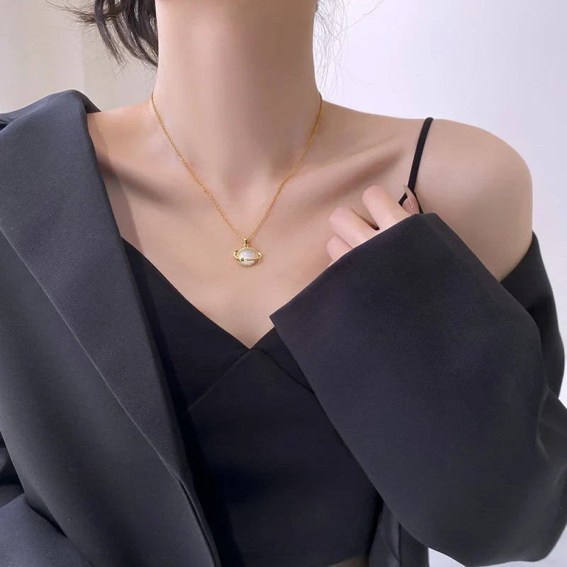 Shining Planet necklace; Luxurious white quartz jewelry; Elegant quartz necklace; White quartz gemstone necklace; Dazzling white quartz pendant; Statement jewelry piece; Artisan-crafted necklace; Nature-inspired luxury; Crystal quartz necklace; Unique gemstone pendant; Shining quartz design; White quartz for elegance;
