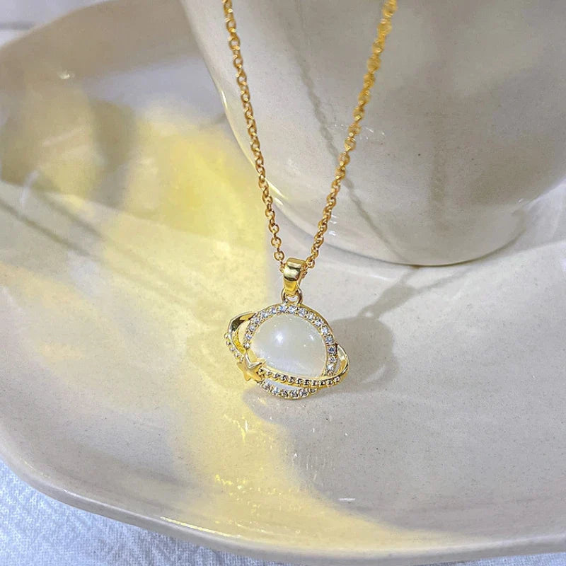 Shining Planet necklace; Luxurious white quartz jewelry; Elegant quartz necklace; White quartz gemstone necklace; Dazzling white quartz pendant; Statement jewelry piece; Artisan-crafted necklace; Nature-inspired luxury; Crystal quartz necklace; Unique gemstone pendant; Shining quartz design; White quartz for elegance;
