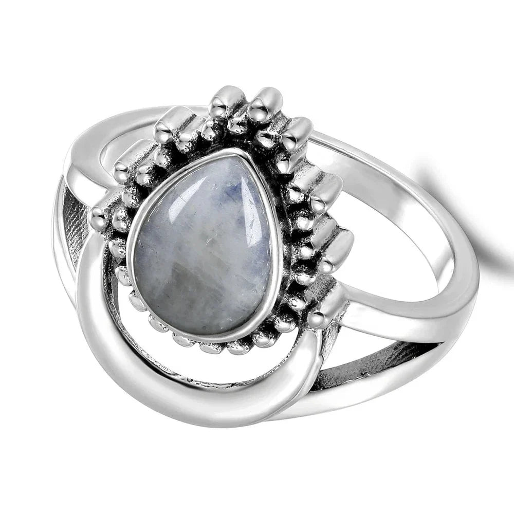 Illuminated Moon ring; Celestial moonstone jewelry; Energetic moonstone ring; Moonstone statement ring; Ethereal moonstone design; Unique celestial jewelry; Healing moonstone ring; Artisan-crafted moonstone piece; Adjustable moonstone ring; Elegant lunar-inspired jewelry; Bohemian moonstone accessory; Natural stone ring; Dazzling moonstone elegance; Celestial-themed ring; Mystical moonstone collection; Handmade moonstone jewelry;