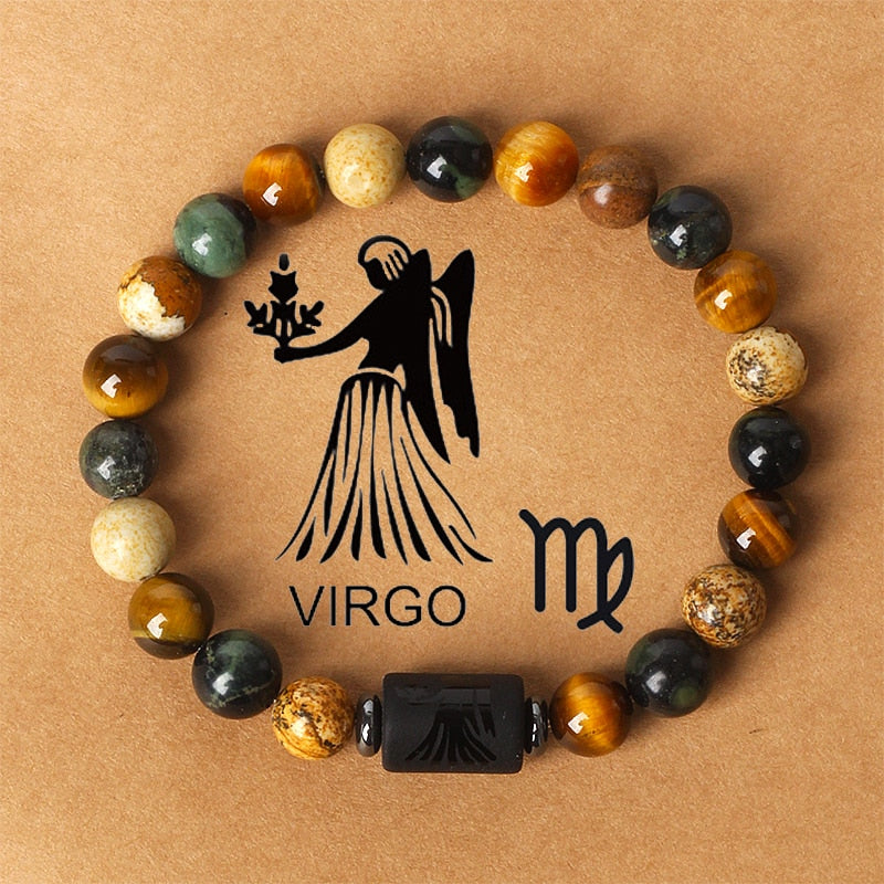 Zodiac sign bracelets; Tiger's Eye bracelet; Handcrafted gemstone jewelry; Unique design for astrological connection; Artisan-crafted accessory; Ethically sourced materials; Gift for astrology enthusiasts; Stylish and meaningful for everyday wear; Durable and fashionable; Beautifully polished Tiger's Eye stones for grounding energy; Unique spiritual gift for zodiac lovers; Bracelet for enhancing intuition and protection; Natural stones for emotional balance and confidence;