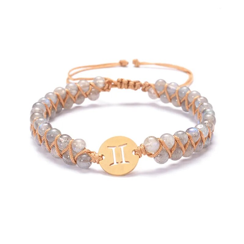 Zodiac bracelet; Braided design; Handcrafted zodiac jewelry; Unique astrological accessory; Artisan-crafted bracelet; Ethically sourced materials; Gift for astrology enthusiasts; Stylish and comfortable for daily wear; Beautiful braided details; Personalized zodiac sign representation; Perfect for layering with other bracelets; Unique spiritual gift; Bracelet for intention setting; Durable and fashionable design; Ideal for any occasion; Symbol of celestial connection;