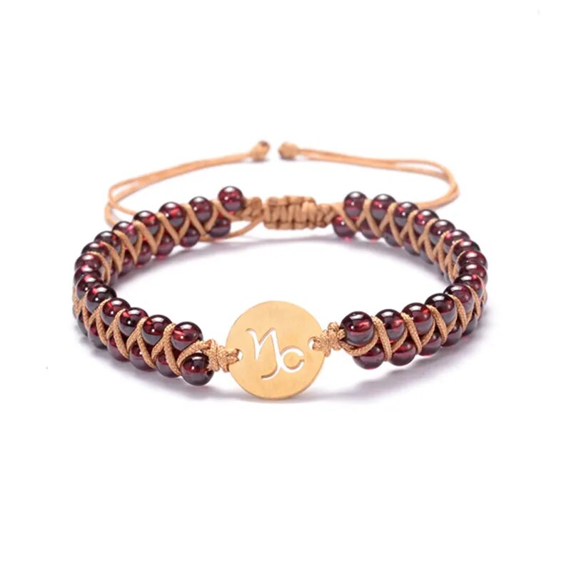 Zodiac bracelet; Braided design; Handcrafted zodiac jewelry; Unique astrological accessory; Artisan-crafted bracelet; Ethically sourced materials; Gift for astrology enthusiasts; Stylish and comfortable for daily wear; Beautiful braided details; Personalized zodiac sign representation; Perfect for layering with other bracelets; Unique spiritual gift; Bracelet for intention setting; Durable and fashionable design; Ideal for any occasion; Symbol of celestial connection;