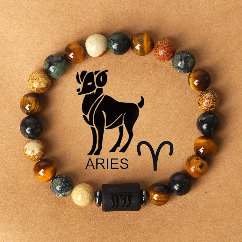 Zodiac sign bracelets; Tiger's Eye bracelet; Handcrafted gemstone jewelry; Unique design for astrological connection; Artisan-crafted accessory; Ethically sourced materials; Gift for astrology enthusiasts; Stylish and meaningful for everyday wear; Durable and fashionable; Beautifully polished Tiger's Eye stones for grounding energy; Unique spiritual gift for zodiac lovers; Bracelet for enhancing intuition and protection; Natural stones for emotional balance and confidence;