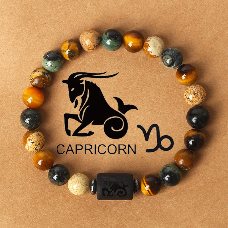 Zodiac sign bracelets; Tiger's Eye bracelet; Handcrafted gemstone jewelry; Unique design for astrological connection; Artisan-crafted accessory; Ethically sourced materials; Gift for astrology enthusiasts; Stylish and meaningful for everyday wear; Durable and fashionable; Beautifully polished Tiger's Eye stones for grounding energy; Unique spiritual gift for zodiac lovers; Bracelet for enhancing intuition and protection; Natural stones for emotional balance and confidence;