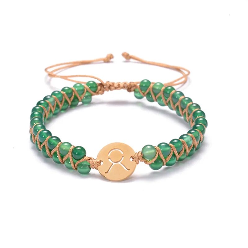 Zodiac bracelet; Braided design; Handcrafted zodiac jewelry; Unique astrological accessory; Artisan-crafted bracelet; Ethically sourced materials; Gift for astrology enthusiasts; Stylish and comfortable for daily wear; Beautiful braided details; Personalized zodiac sign representation; Perfect for layering with other bracelets; Unique spiritual gift; Bracelet for intention setting; Durable and fashionable design; Ideal for any occasion; Symbol of celestial connection;