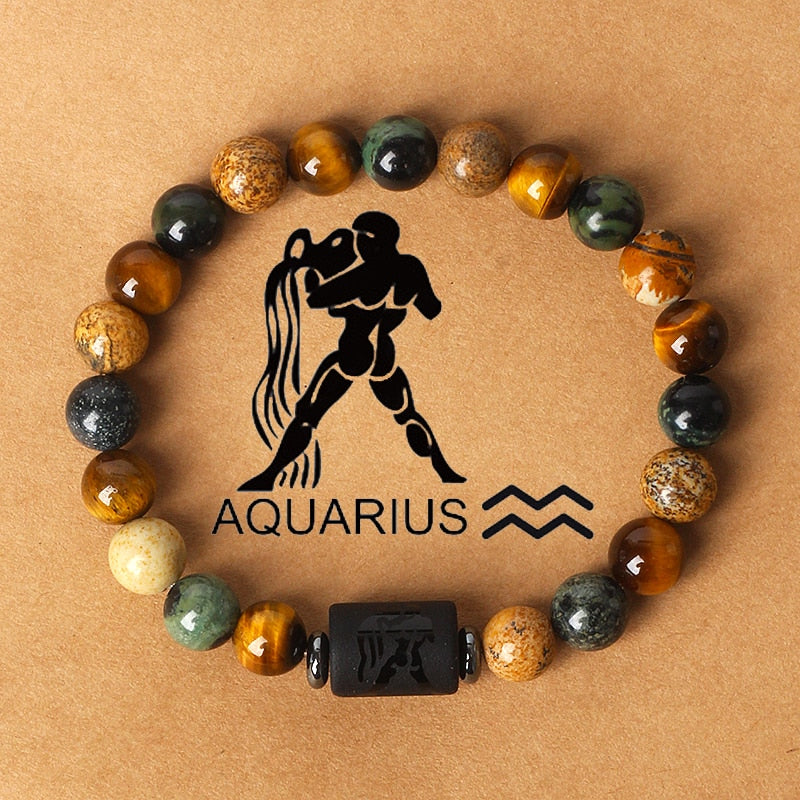 Zodiac sign bracelets; Tiger's Eye bracelet; Handcrafted gemstone jewelry; Unique design for astrological connection; Artisan-crafted accessory; Ethically sourced materials; Gift for astrology enthusiasts; Stylish and meaningful for everyday wear; Durable and fashionable; Beautifully polished Tiger's Eye stones for grounding energy; Unique spiritual gift for zodiac lovers; Bracelet for enhancing intuition and protection; Natural stones for emotional balance and confidence;