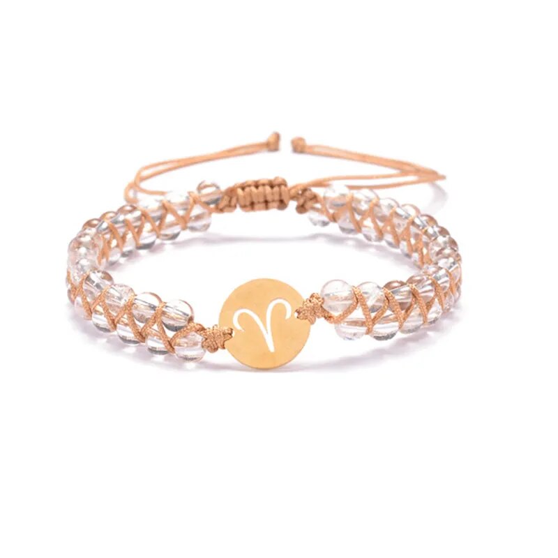 Zodiac bracelet; Braided design; Handcrafted zodiac jewelry; Unique astrological accessory; Artisan-crafted bracelet; Ethically sourced materials; Gift for astrology enthusiasts; Stylish and comfortable for daily wear; Beautiful braided details; Personalized zodiac sign representation; Perfect for layering with other bracelets; Unique spiritual gift; Bracelet for intention setting; Durable and fashionable design; Ideal for any occasion; Symbol of celestial connection;