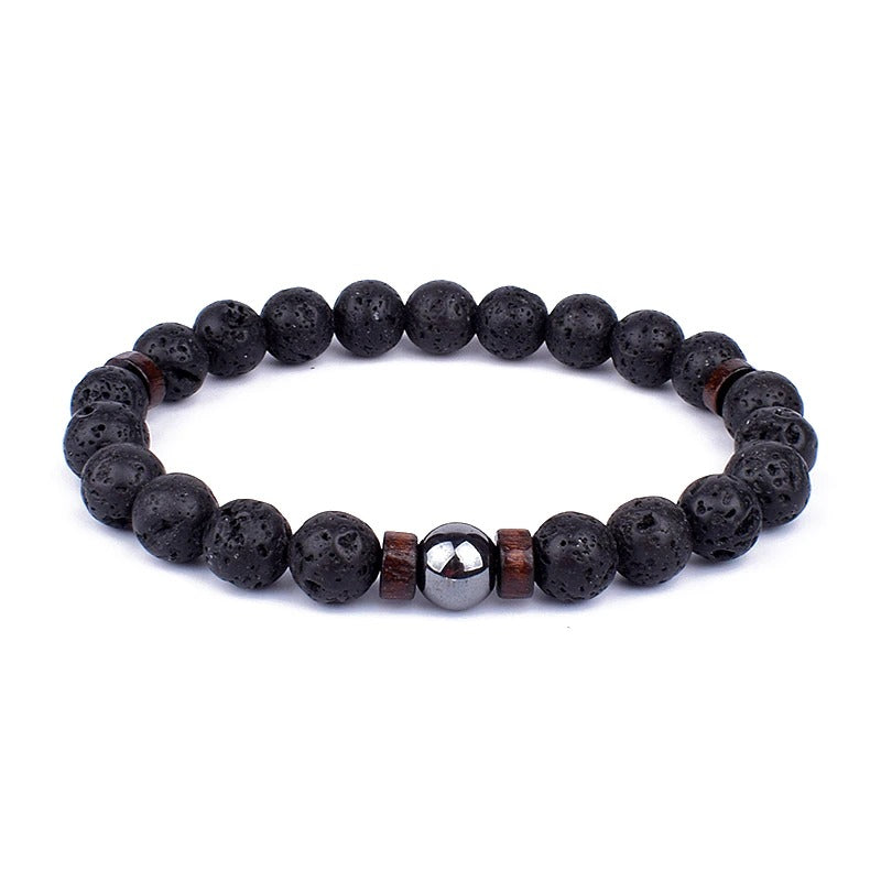 Tibetan bracelet; Volcanic lava stone bracelet; Handcrafted spiritual jewelry; Unique design for grounding and strength; Artisan-crafted accessory; Ethically sourced volcanic lava; Gift for those seeking stability; Stylish and rugged for everyday wear; Durable and fashionable; Beautifully textured lava beads; Unique spiritual gift; Bracelet for protection and emotional balance; Natural stones for personal empowerment; Lightweight and comfortable; Ideal for meditation practices;