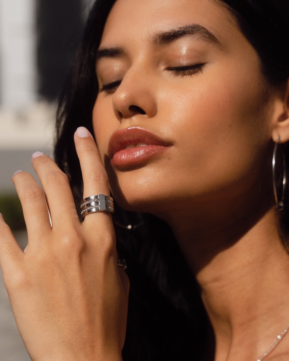 caviar stack ring; silver jewelry; modern stacking ring; elegant design; versatile accessory; handcrafted quality; trendy and fashionable; unique texture; perfect for layering; chic and sophisticated; timeless elegance; lightweight and comfortable; ideal for everyday wear; customizable look; stylish statement piece; durable craftsmanship; beautiful shine; minimalist aesthetic; exquisite silver finish; perfect gift for her; eye-catching ring; refined and modern; adds dimension to any outfit;