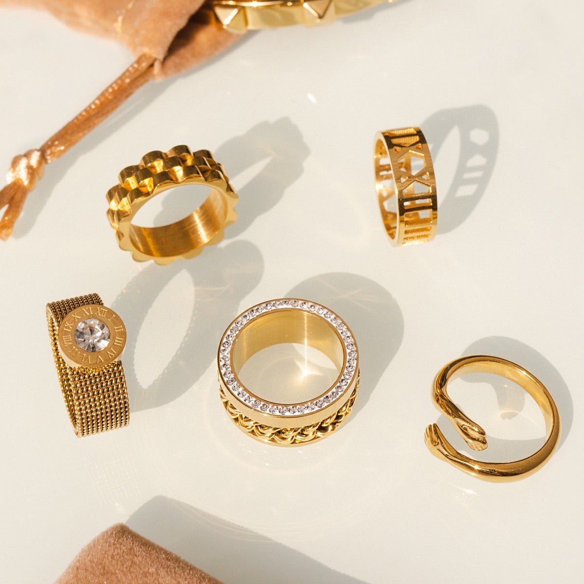 Zirconia links ring; 18K gold-plated ring; Elegant zirconia ring; Fashionable link ring; Gold-plated zirconia jewelry; Unique gold ring design; Chic zirconia links; Stylish 18K gold ring; Luxurious gold-plated jewelry; Zirconia embellished ring; Statement gold ring; High-quality zirconia ring; Contemporary gold ring; Radiant zirconia links; Glamorous gold-plated ring; Designer link ring; Stunning zirconia jewelry; Gold-plated fashion ring;