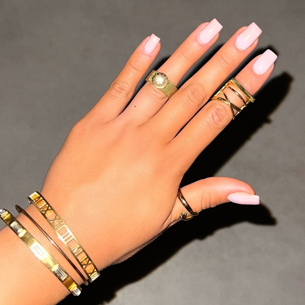 roman mesh ring; 18k gold plated jewelry; unique mesh design; elegant gold ring; sophisticated fashion accessory; perfect for stacking; luxurious and stylish; quality craftsmanship; lightweight and comfortable; trendy gold jewelry; versatile design for any occasion; eye-catching mesh pattern; statement ring; handcrafted elegance; modern gold accessory; timeless piece; durable and long-lasting; ideal gift for her; enhance your outfit;