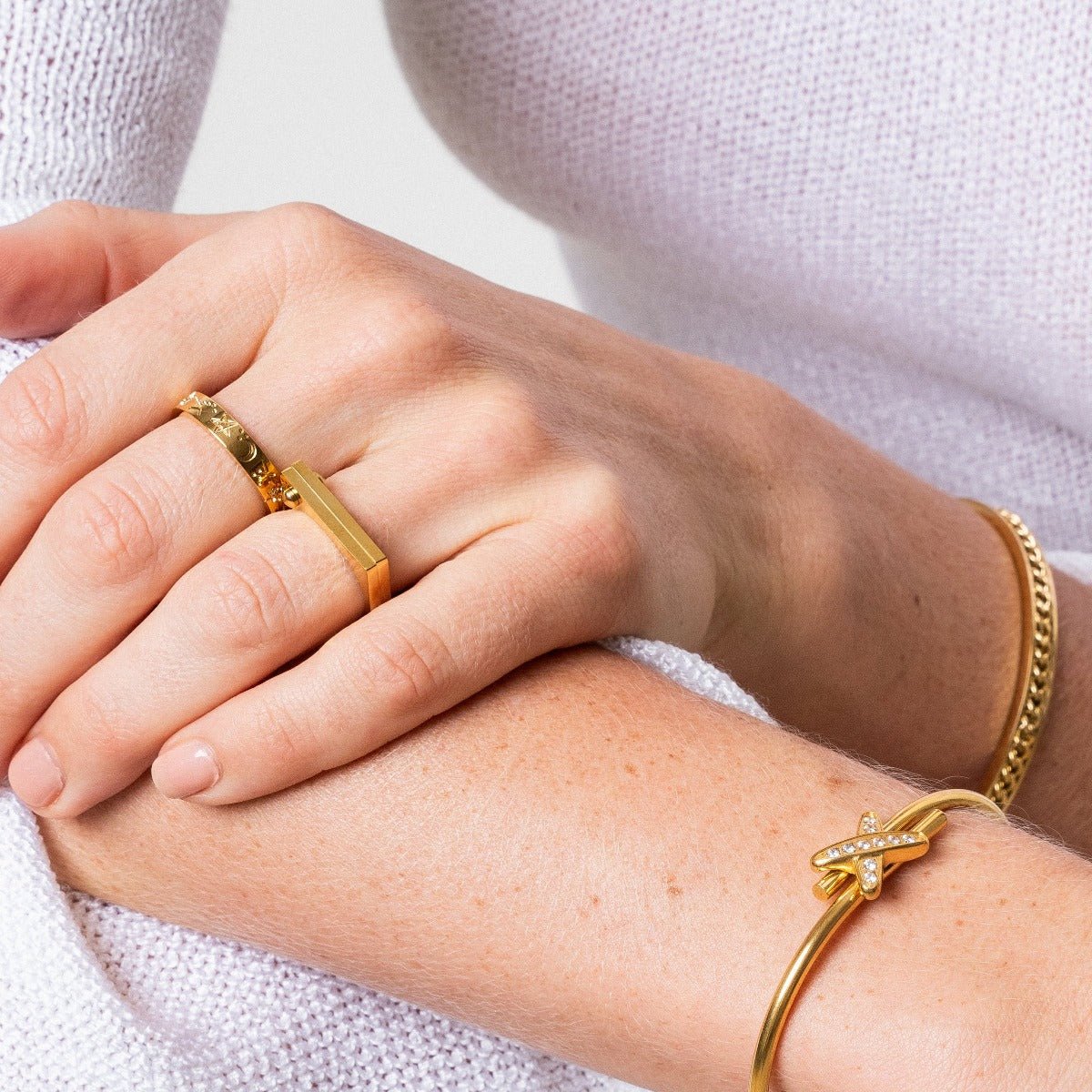 sky ring; 18k gold plated jewelry; celestial design ring; elegant fashion accessory; high-quality craftsmanship; unique gift for her; minimalist gold ring; sophisticated style; dreamy aesthetic; luxurious appearance; adjustable fit; versatile everyday wear; perfect for layering; stylish statement piece; ethereal gold finish; trendy jewelry; fashionable gold accessory; timeless elegance; unique gift idea; chic and modern; essential addition to any jewelry collection; radiant shine; fine jewelry piece;