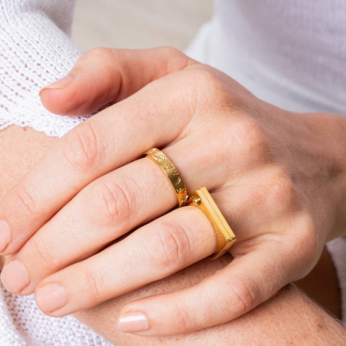 sky ring; 18k gold plated jewelry; celestial design ring; elegant fashion accessory; high-quality craftsmanship; unique gift for her; minimalist gold ring; sophisticated style; dreamy aesthetic; luxurious appearance; adjustable fit; versatile everyday wear; perfect for layering; stylish statement piece; ethereal gold finish; trendy jewelry; fashionable gold accessory; timeless elegance; unique gift idea; chic and modern; essential addition to any jewelry collection; radiant shine; fine jewelry piece;
