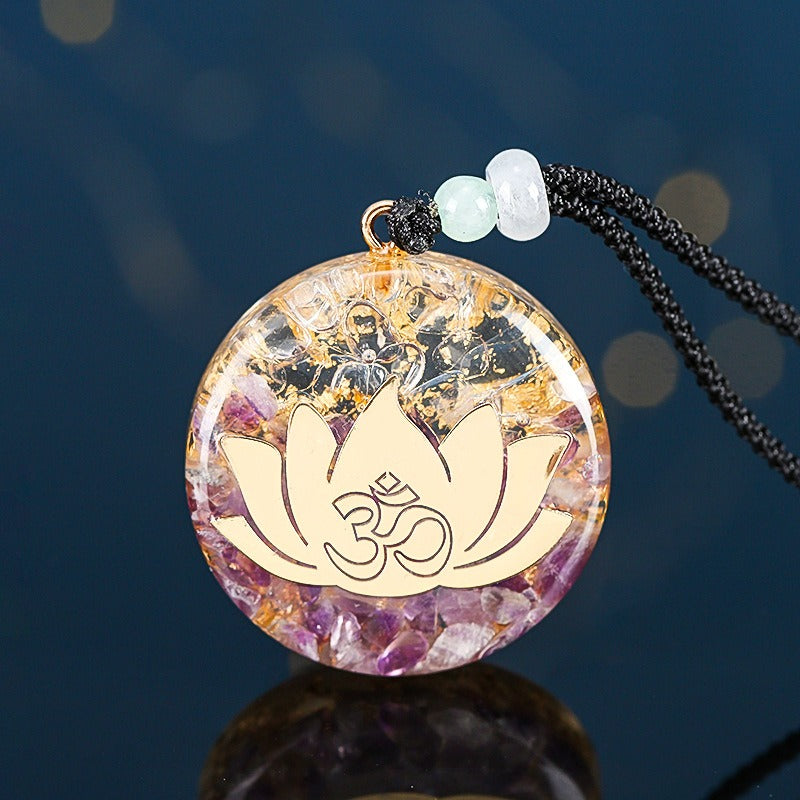 Orgonite lotus flower necklace; Handcrafted spiritual jewelry; Unique design symbolizing purity and enlightenment; Artisan-crafted accessory; Ethically sourced materials; Gift for those seeking peace and spiritual growth; Stylish and meaningful for everyday wear; Durable and fashionable; Beautifully detailed lotus flower for spiritual connection; Unique spiritual gift; Necklace for enhancing positive energy and protection; Natural elements for emotional healing and balance;