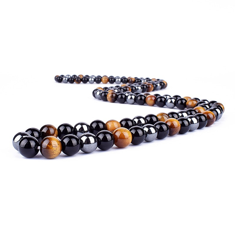 Triple protection necklace; Symbol of protection, power, and balance; Handcrafted artisan jewelry; Unique design for spiritual strength; Ethically sourced materials for conscious living; Perfect gift for those seeking inner strength; Enhances personal energy and resilience; Durable and stylish for everyday wear; Lightweight and comfortable for all-day use; Ideal for layering with other necklaces; Represents harmony and well-being; Thoughtful gift for special occasions;