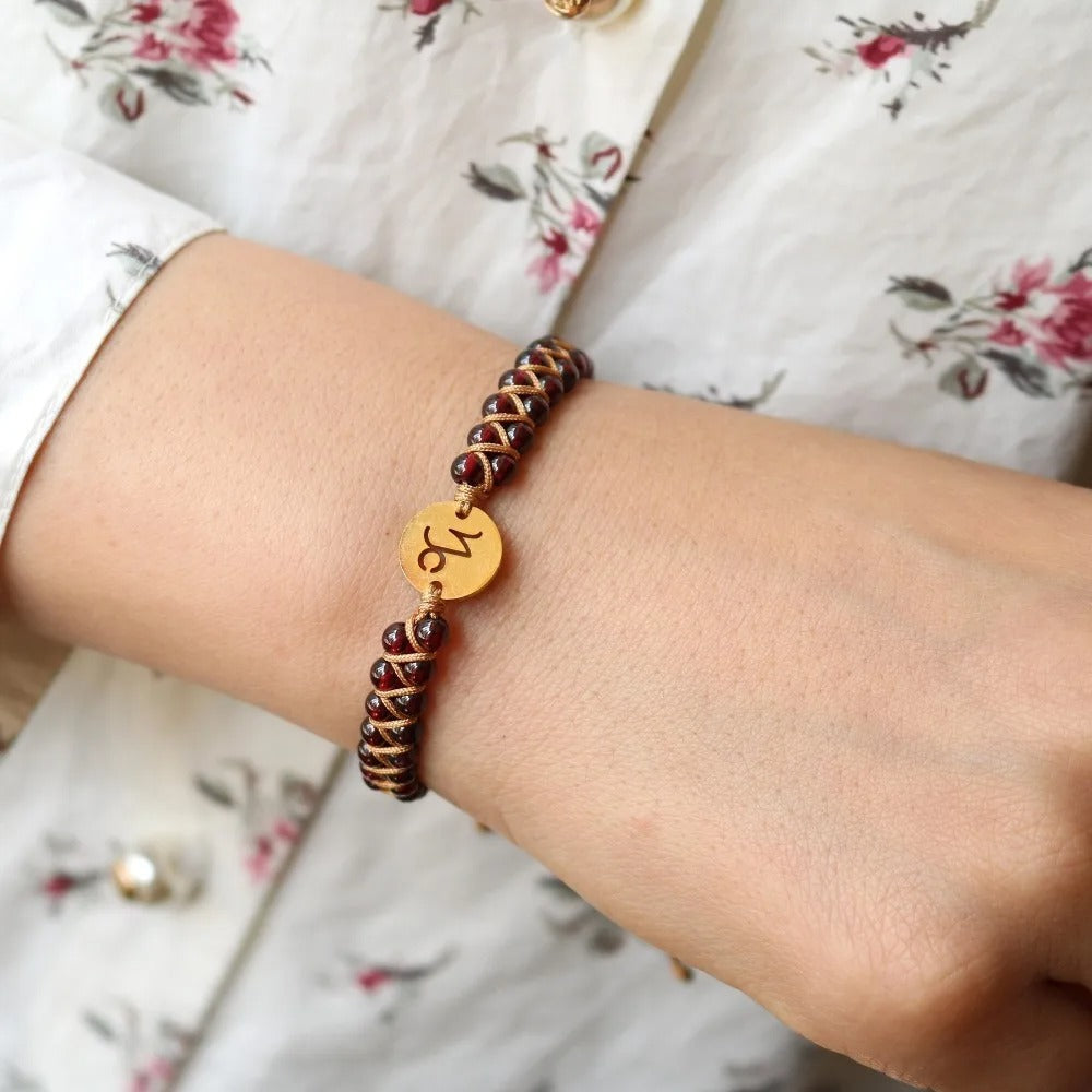 Zodiac bracelet; Braided design; Handcrafted zodiac jewelry; Unique astrological accessory; Artisan-crafted bracelet; Ethically sourced materials; Gift for astrology enthusiasts; Stylish and comfortable for daily wear; Beautiful braided details; Personalized zodiac sign representation; Perfect for layering with other bracelets; Unique spiritual gift; Bracelet for intention setting; Durable and fashionable design; Ideal for any occasion; Symbol of celestial connection;