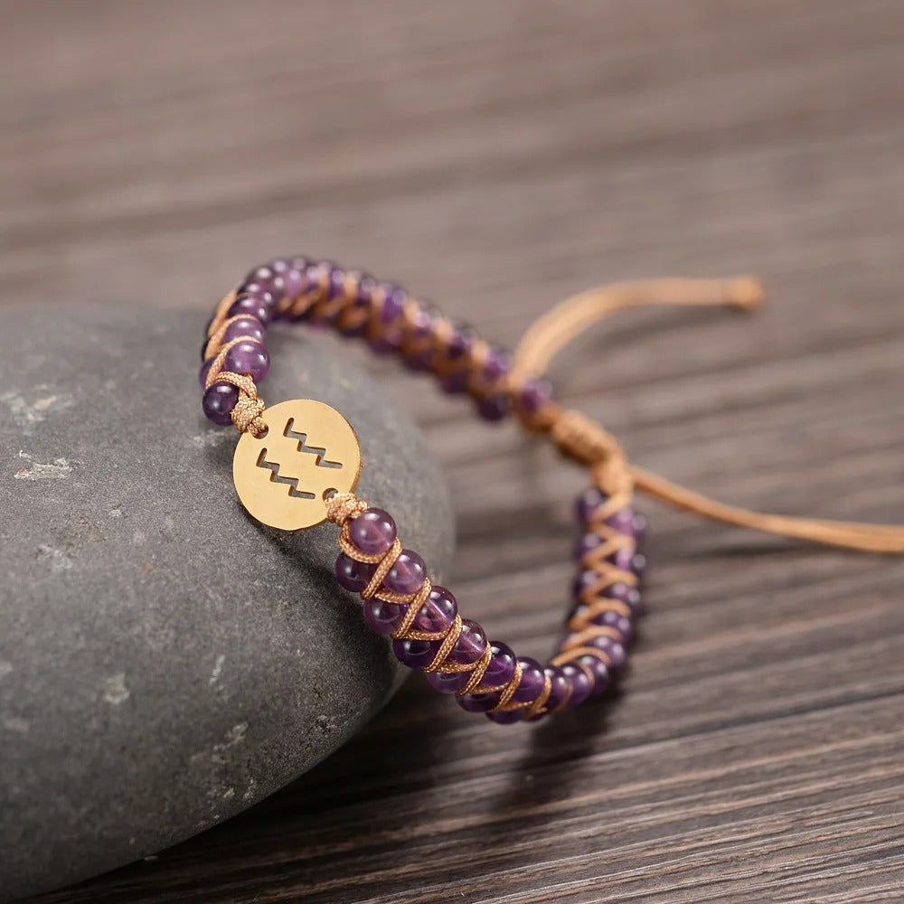 Zodiac bracelet; Braided design; Handcrafted zodiac jewelry; Unique astrological accessory; Artisan-crafted bracelet; Ethically sourced materials; Gift for astrology enthusiasts; Stylish and comfortable for daily wear; Beautiful braided details; Personalized zodiac sign representation; Perfect for layering with other bracelets; Unique spiritual gift; Bracelet for intention setting; Durable and fashionable design; Ideal for any occasion; Symbol of celestial connection;