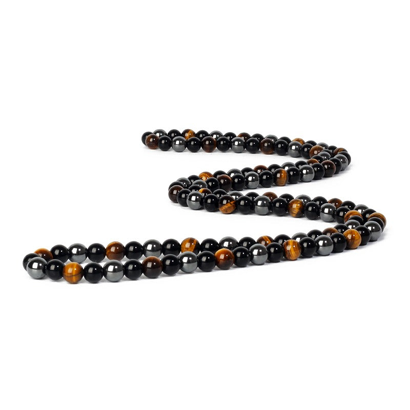 Triple protection necklace; Symbol of protection, power, and balance; Handcrafted artisan jewelry; Unique design for spiritual strength; Ethically sourced materials for conscious living; Perfect gift for those seeking inner strength; Enhances personal energy and resilience; Durable and stylish for everyday wear; Lightweight and comfortable for all-day use; Ideal for layering with other necklaces; Represents harmony and well-being; Thoughtful gift for special occasions;