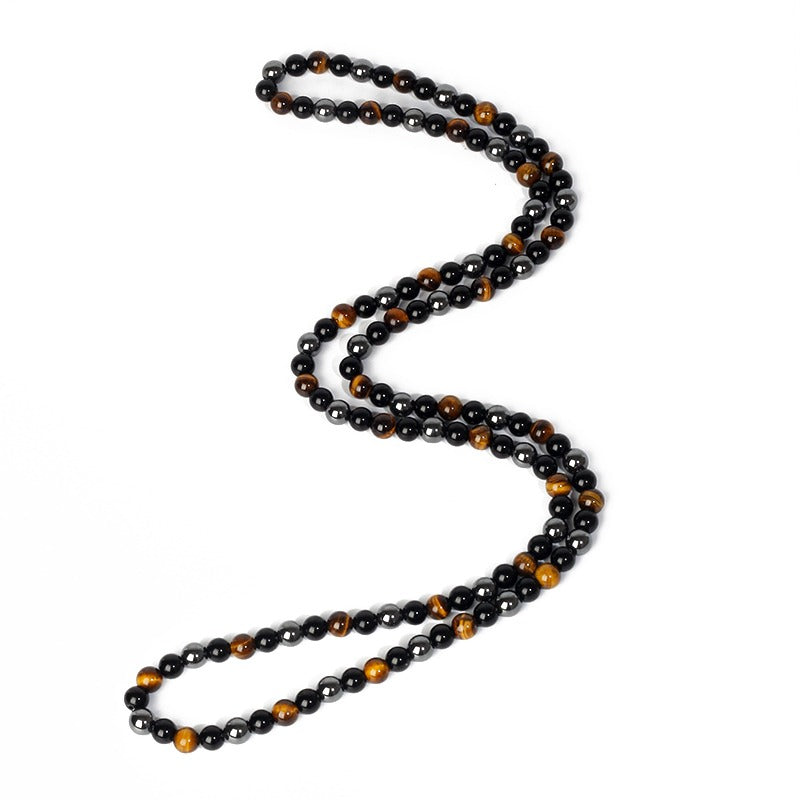 Triple protection necklace; Symbol of protection, power, and balance; Handcrafted artisan jewelry; Unique design for spiritual strength; Ethically sourced materials for conscious living; Perfect gift for those seeking inner strength; Enhances personal energy and resilience; Durable and stylish for everyday wear; Lightweight and comfortable for all-day use; Ideal for layering with other necklaces; Represents harmony and well-being; Thoughtful gift for special occasions;