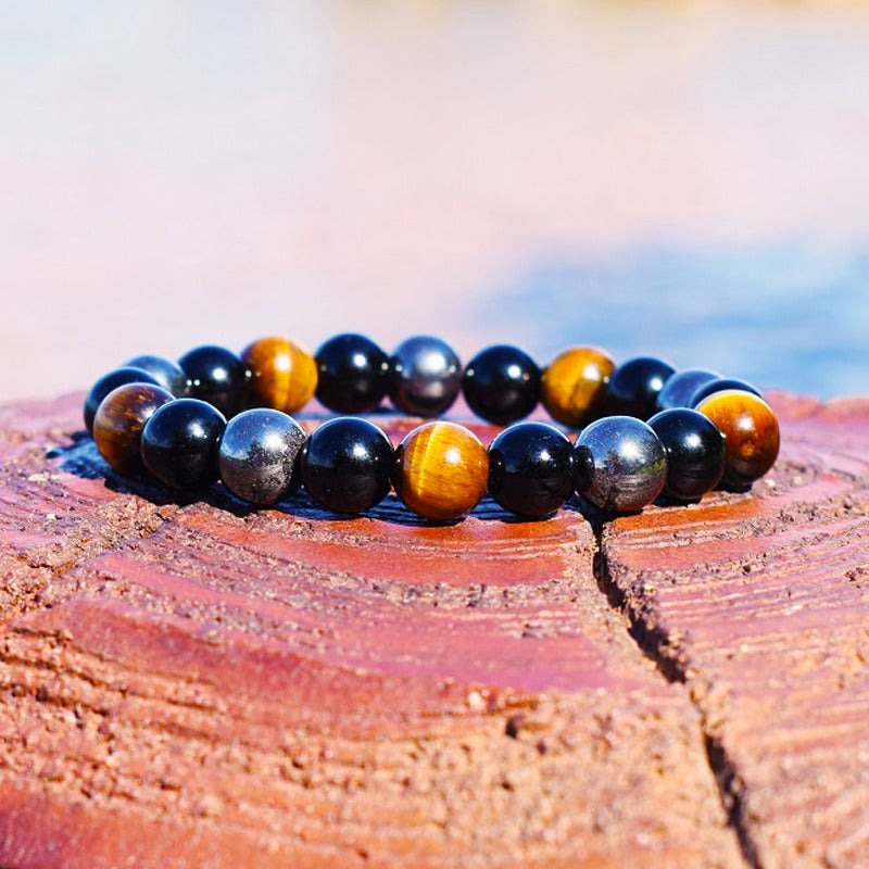 Triple protection bracelet; Protection, power, and balance bracelet; Handcrafted gemstone jewelry; Unique design for spiritual shielding; Artisan-crafted accessory; Ethically sourced materials; Gift for those seeking strength and security; Stylish and protective for everyday wear; Durable and fashionable; Beautifully polished stones for protection and grounding; Unique spiritual gift; Bracelet for enhancing personal power and stability; Natural stones for emotional balance and inner strength;