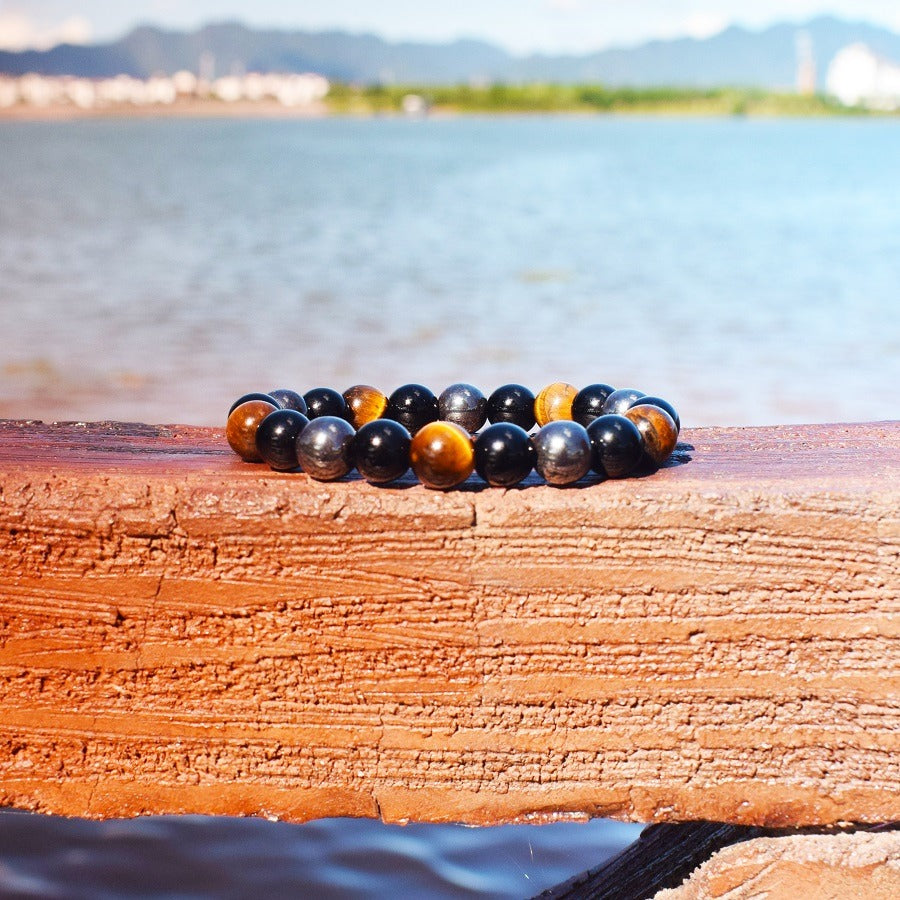 Triple protection bracelet; Protection, power, and balance bracelet; Handcrafted gemstone jewelry; Unique design for spiritual shielding; Artisan-crafted accessory; Ethically sourced materials; Gift for those seeking strength and security; Stylish and protective for everyday wear; Durable and fashionable; Beautifully polished stones for protection and grounding; Unique spiritual gift; Bracelet for enhancing personal power and stability; Natural stones for emotional balance and inner strength;