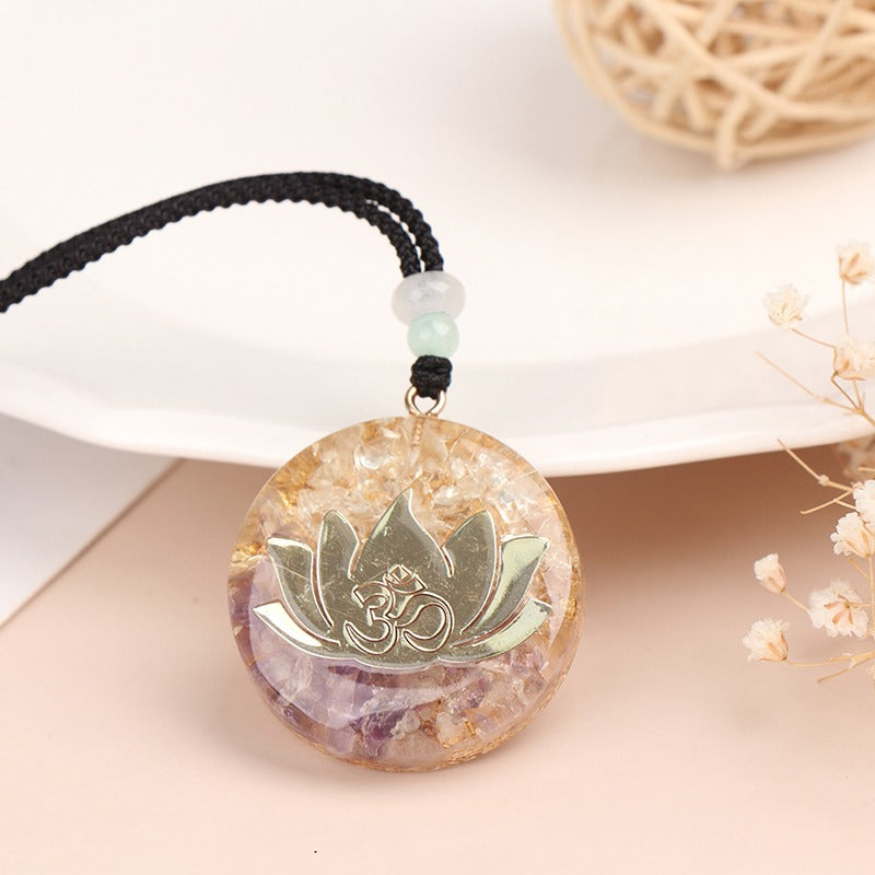 Orgonite lotus flower necklace; Handcrafted spiritual jewelry; Unique design symbolizing purity and enlightenment; Artisan-crafted accessory; Ethically sourced materials; Gift for those seeking peace and spiritual growth; Stylish and meaningful for everyday wear; Durable and fashionable; Beautifully detailed lotus flower for spiritual connection; Unique spiritual gift; Necklace for enhancing positive energy and protection; Natural elements for emotional healing and balance;