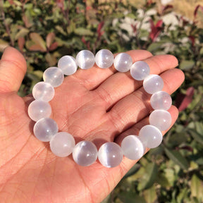 Selenite purification bracelet; Selenite stone bracelet; Handcrafted natural stone jewelry; Unique design for cleansing and healing; Artisan-crafted accessory; Ethically sourced selenite; Gift for spiritual enthusiasts; Stylish and elegant for everyday wear; Durable and fashionable; Beautifully polished selenite beads; Unique spiritual gift; Bracelet for energy clearing and purification; Natural stones for emotional balance; Lightweight and comfortable; Ideal for meditation practices;