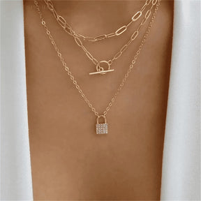Divine necklace set; Pearl and crucifix jewelry; Elegant pearl necklaces; Stylish crucifix pendants; Handmade pearl jewelry; Christian faith necklaces; Unique pearl and crucifix design; Versatile necklace set; Fashionable religious jewelry; Statement pearl necklaces; Personalized crucifix necklaces; Luxurious pearl and gold jewelry; Spiritual symbolism necklaces; Layered pearl necklace set; Artisan-crafted crucifix jewelry; Gift for faith; Beautifully designed pearl necklaces; Modern crucifix jewelry; 